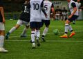 a group of men playing football