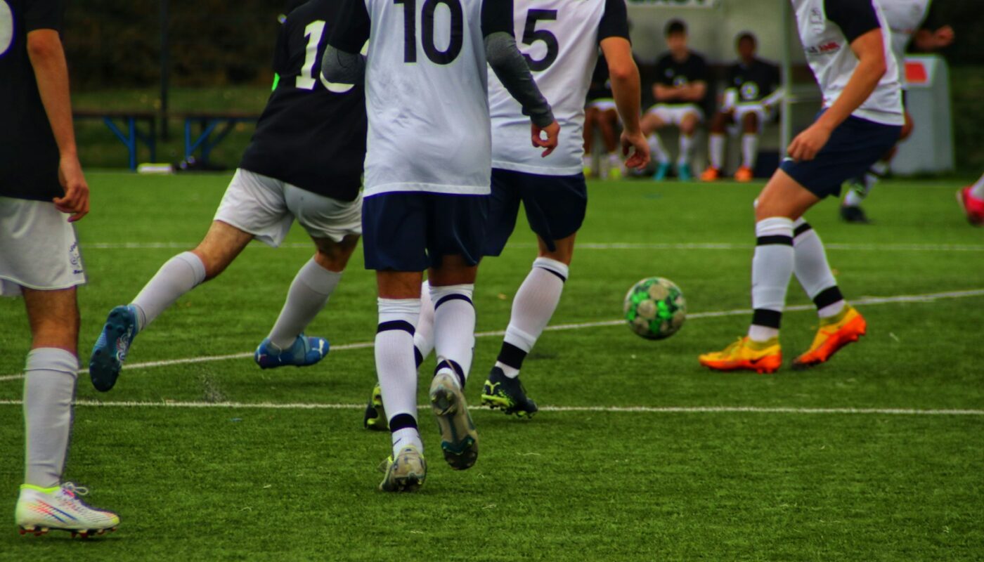 a group of men playing football